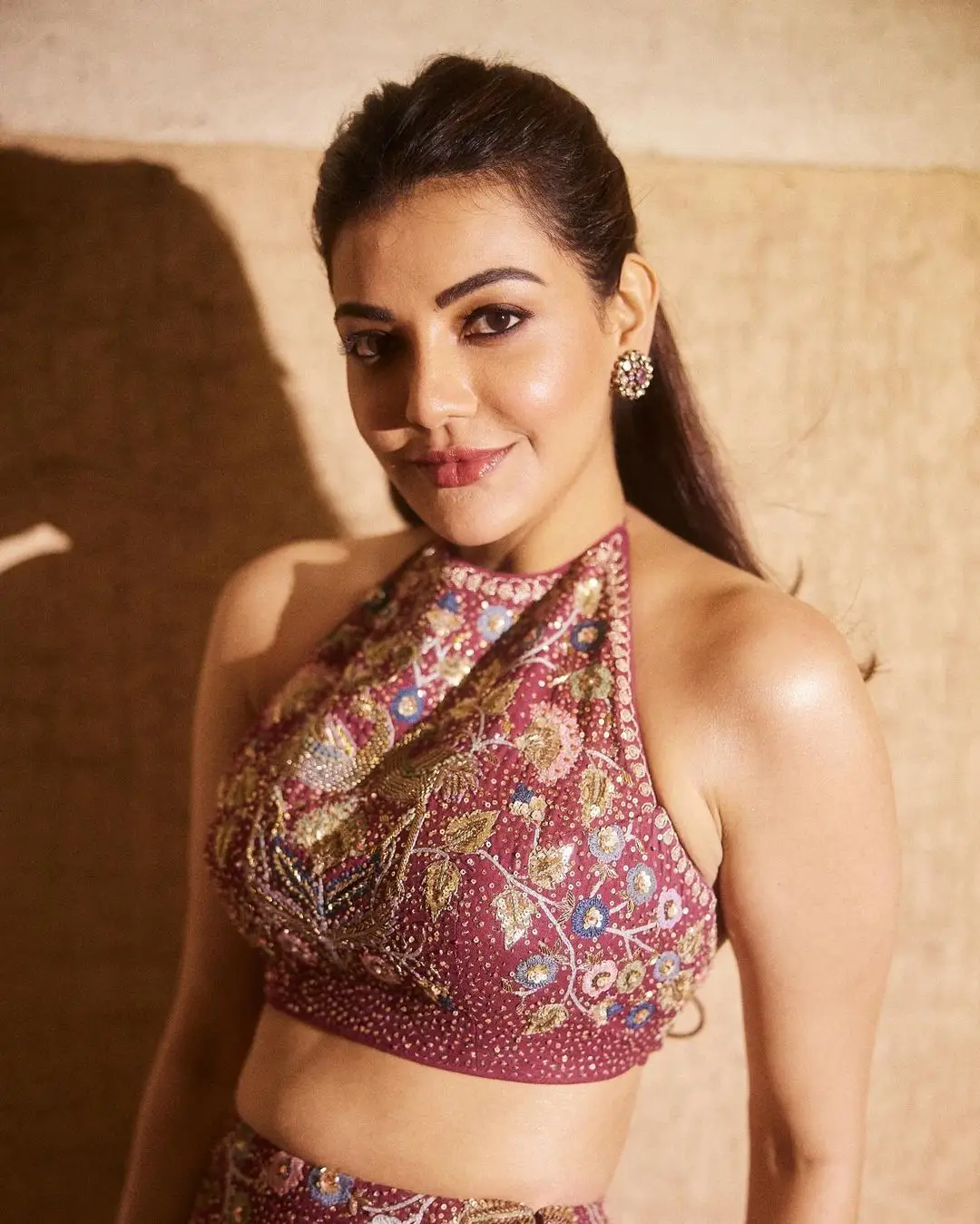 Kajal Aggarwal Stills In Beautiful Maroon Lehenga Choli